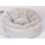Coussin rond beige et blanc